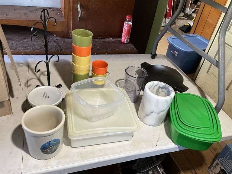 Marble utensil holder, some Tupperware, mug rack - Legacy Auction Company