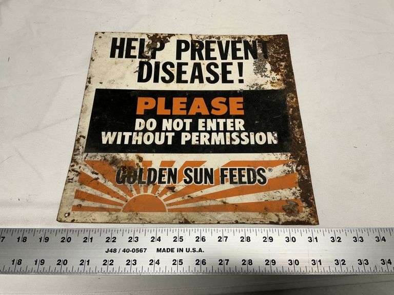 Metal Golden Sun Feeds sign