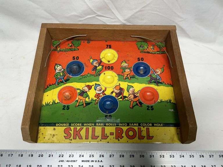 Vintage 1950s tin skill roll game