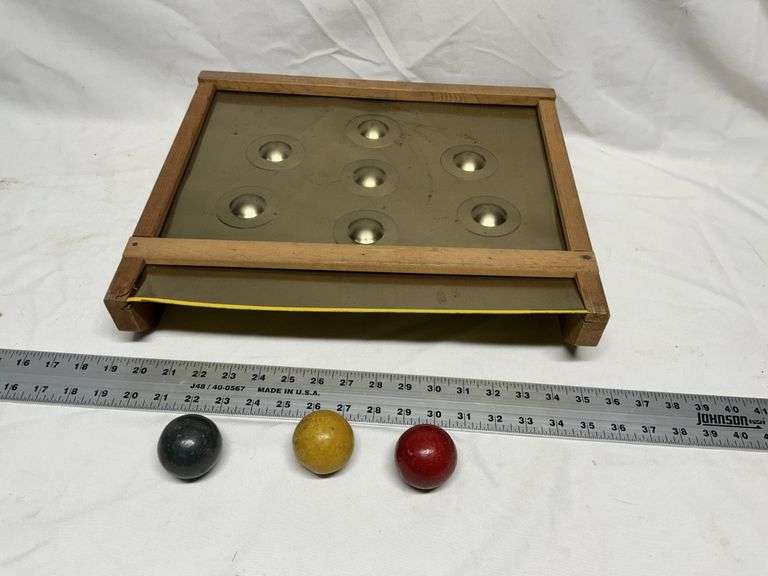 Vintage 1950s tin skill roll game
