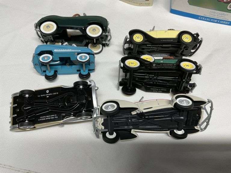 Hallmark cars and Christmas tree ornaments