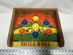 Vintage 1950s tin skill roll game