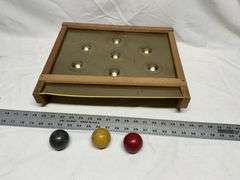 Vintage 1950s tin skill roll game