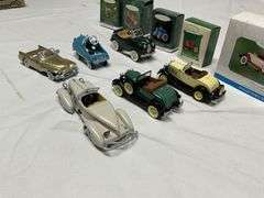 Hallmark cars and Christmas tree ornaments