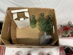 Coca-Cola bottles, some full!