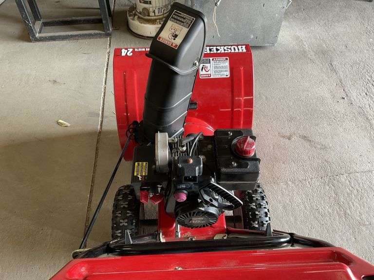 Huskee Electric start 24 inch snowblower. New Legacy Auction Company