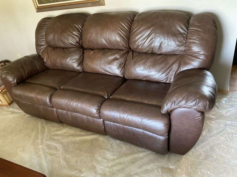Ashley 93 inch couch with recliners on both ends Legacy Auction Company