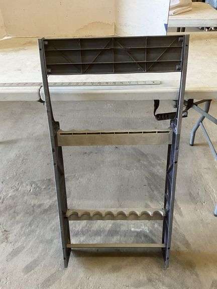 Okuma Rod Display Rack Okuma plastic display rack and minnow buckets - Legacy Auction Company