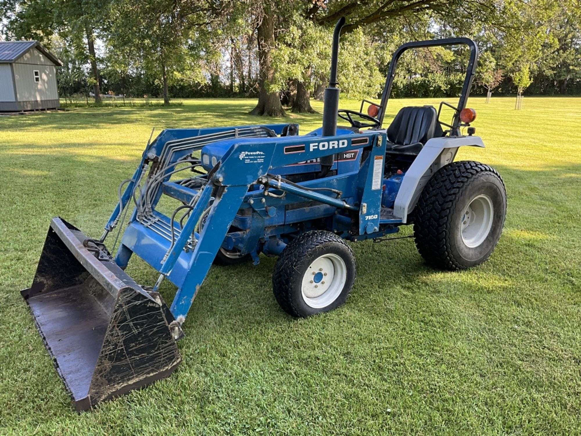 Ford 1620 w/7108 loader - Legacy Auction Company