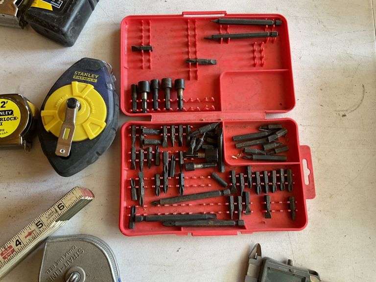 Squares, tape measures, and assorted tools