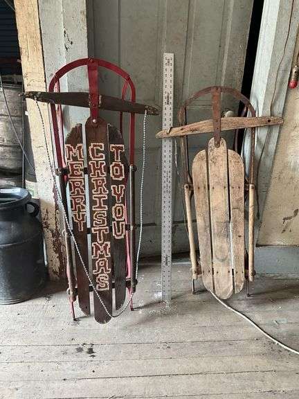 2 wood sleds