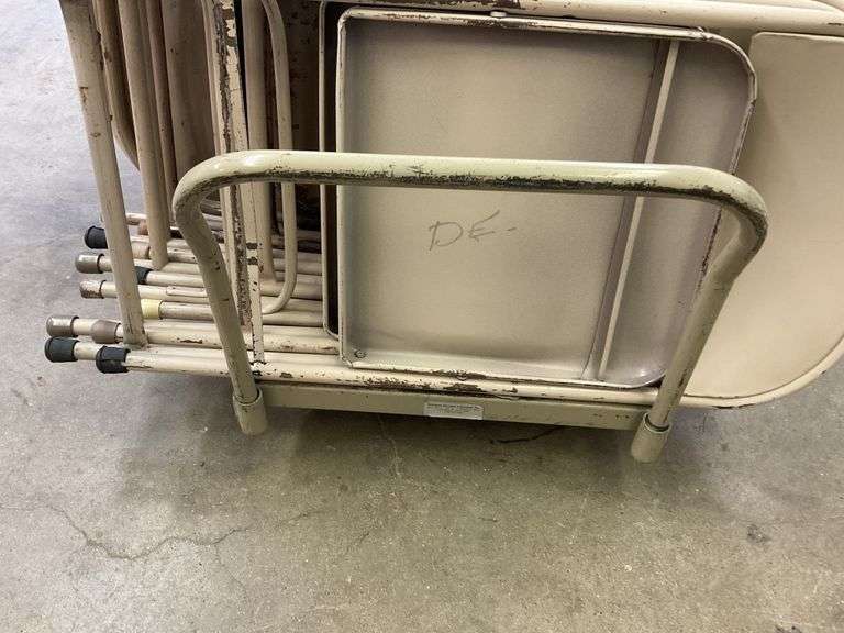 Approx. 64 folding metal chairs and cart