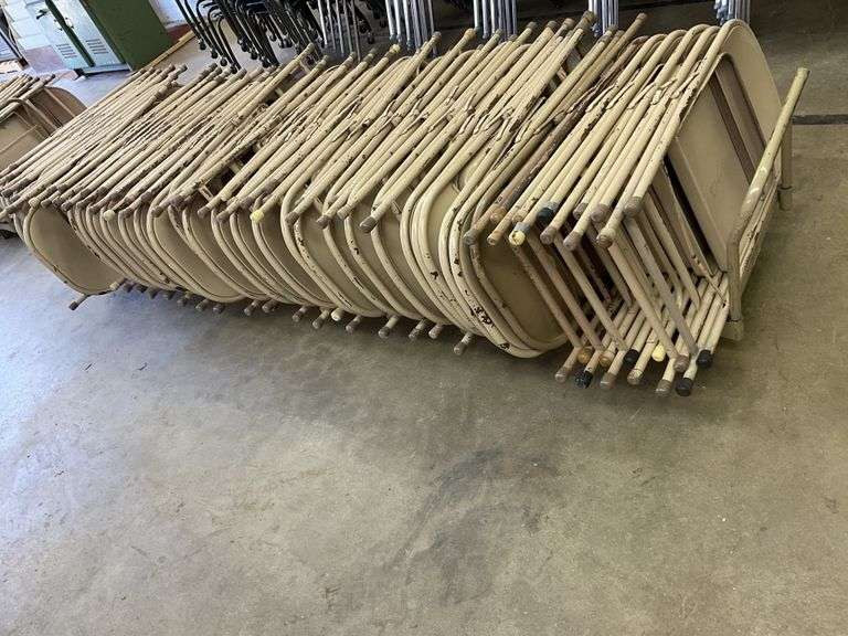 Approx. 64 folding metal chairs and cart