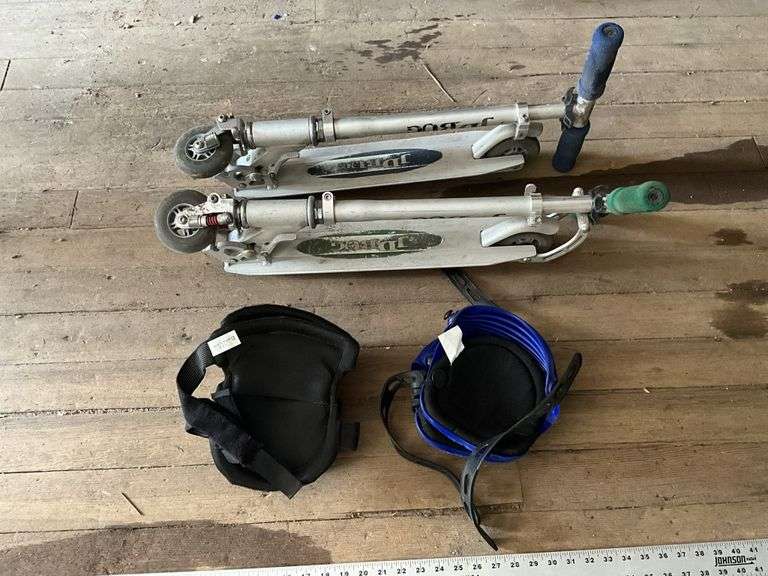 2 JD Bug scooters and kneepads