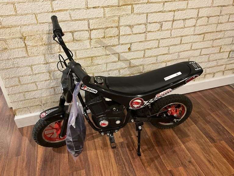 Burma’s TT350R battery mini bike, works! Has  charger and manuals