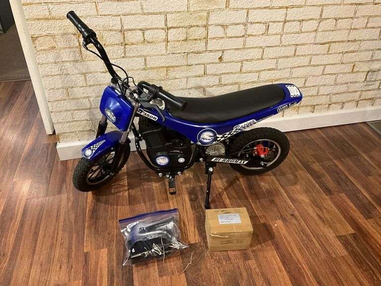 BurroMax TT350R battery minibike works! Has  charger and manuals extra battery