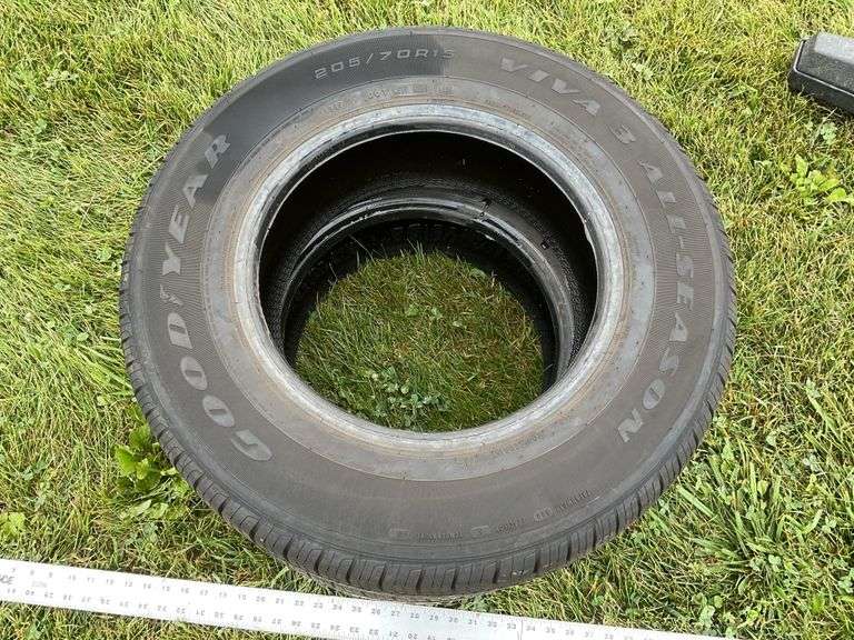 2 Goodyear 205/70R15 Tires. - Legacy Auction Company