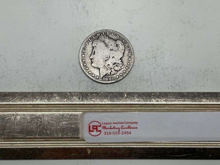 1880 O Morgan silver dollar