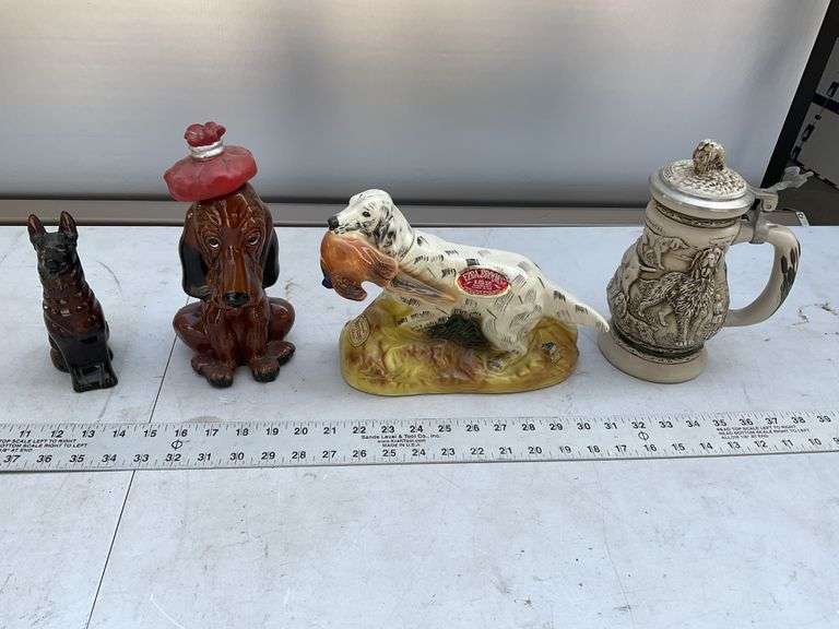 Stein, two decanters and Avon dog