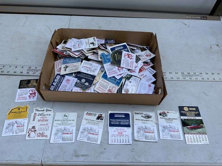 Assorted stick on advertising calendars