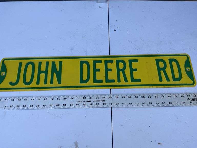 Metal John Deere Rd sign - Legacy Auction Company