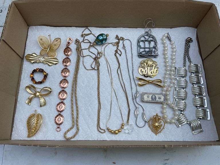 Necklaces and pins etc.