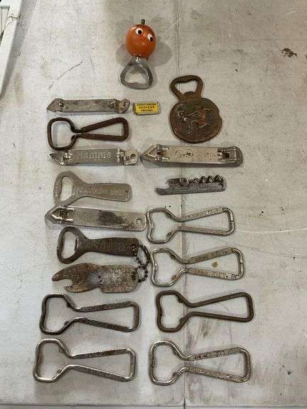 Cigar box with vintage beer openers,  etc.