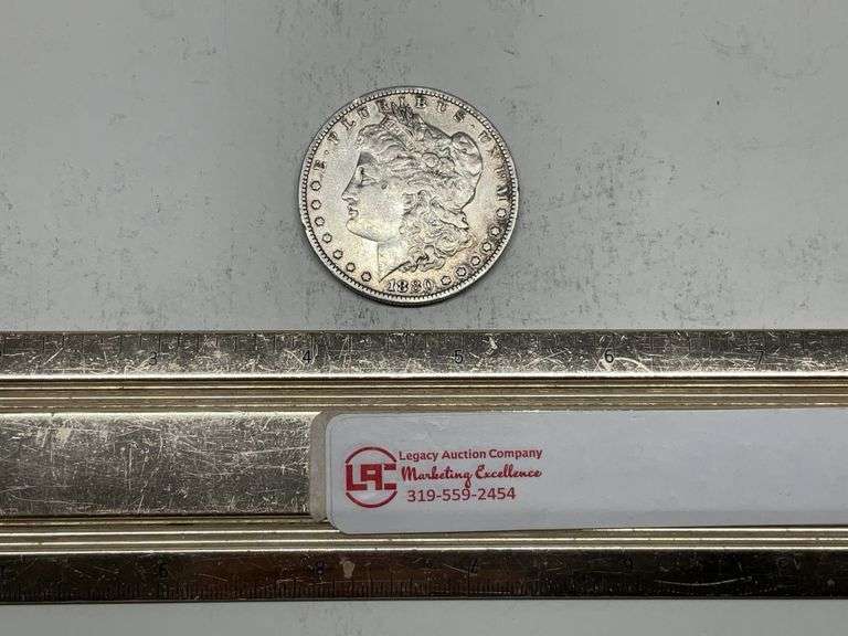 1880 O Morgan silver dollar