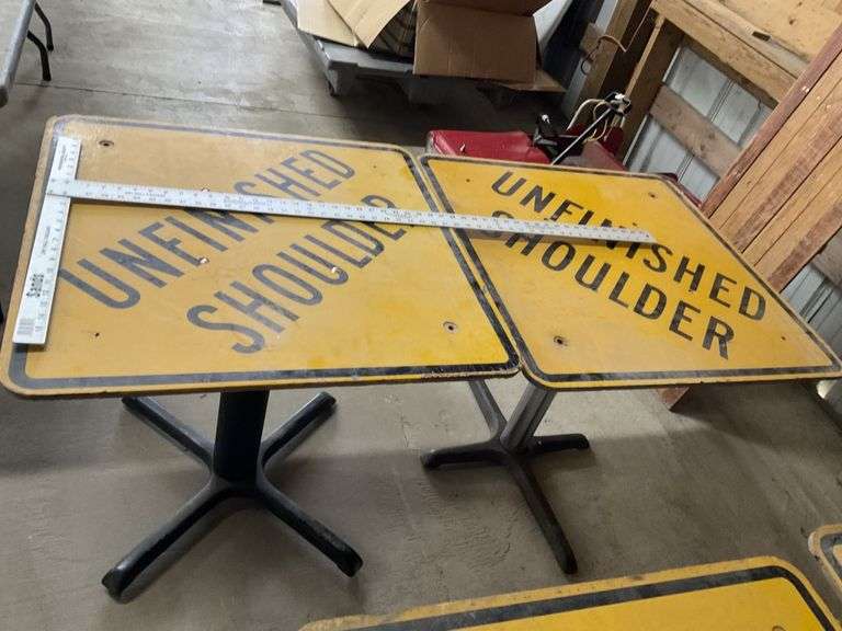 30 x 30 tables with Unfinished Shoulder signs on