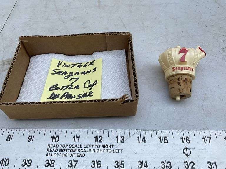 Vintage Seagram's 7 bottle cap dispenser