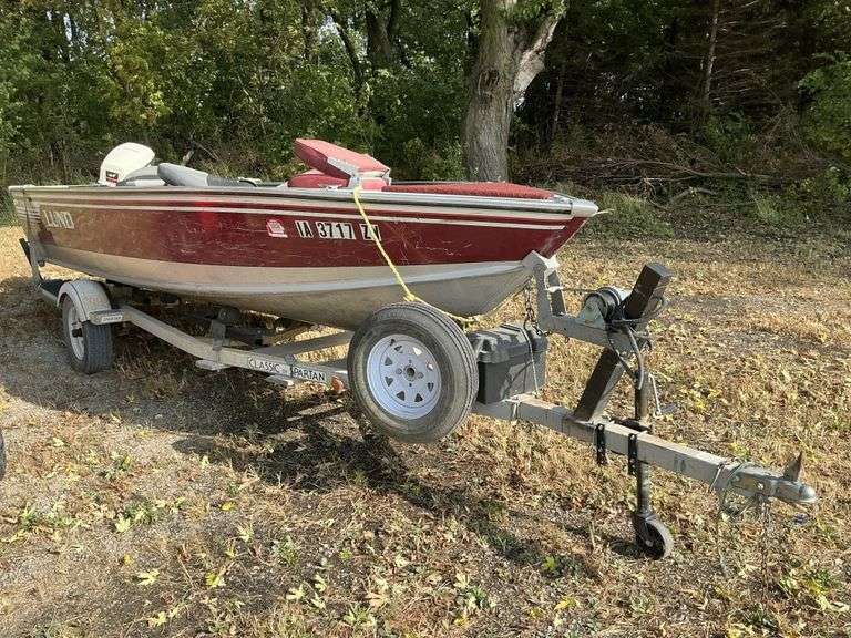 1988 16' Lund boat with trailer