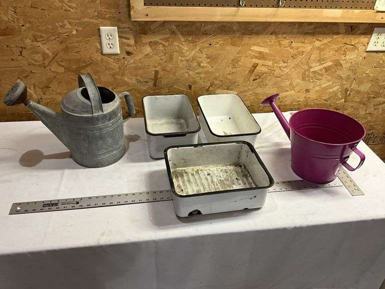 White and black enamelware pans, galvanized