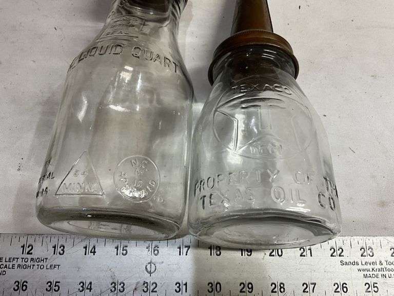 Vintage glass oil dispensers. One Texaco