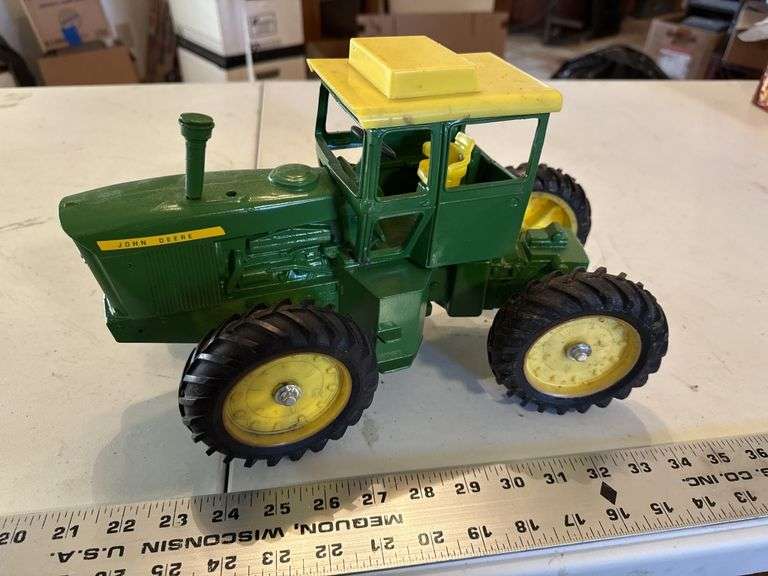 John Deere four-wheel-drive tractor