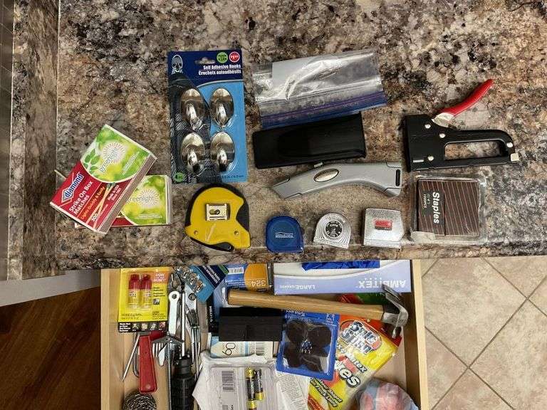 Kitchen utility drawer items including tape - Legacy Auction Company