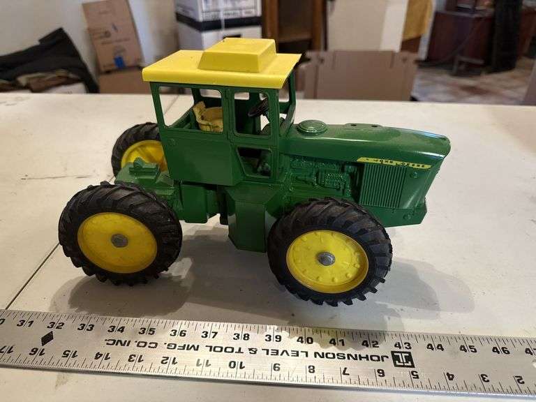 John Deere four-wheel-drive tractor
