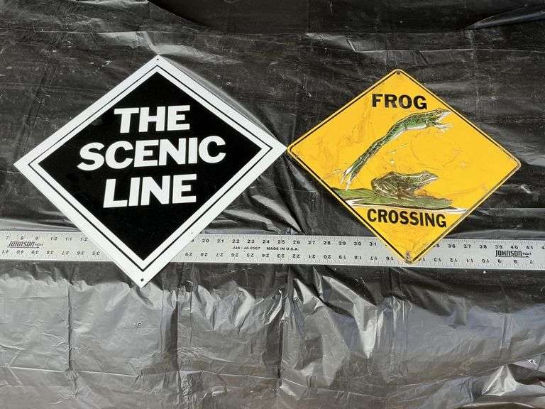 Metal signs, one on the left is heavy!