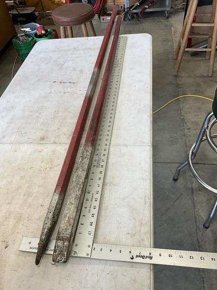 60 and 68 1/2 inches long bars - Legacy Auction Company