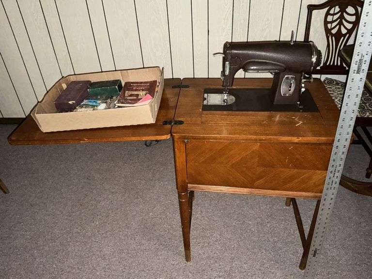 Vintage Kenmore sewing machine with cabinet and - Legacy Auction Company