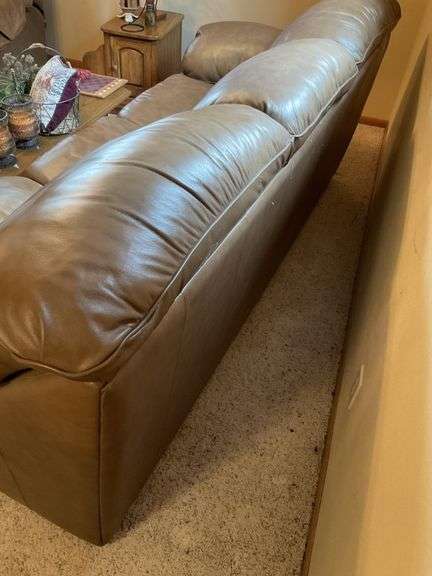 Leather couch in basement, 92''