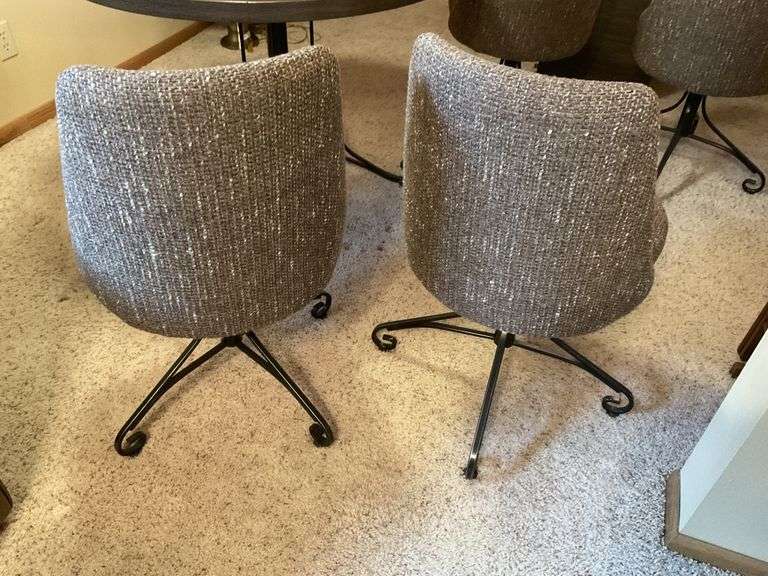 40" table, 4- swivel chairs, 1- leaf