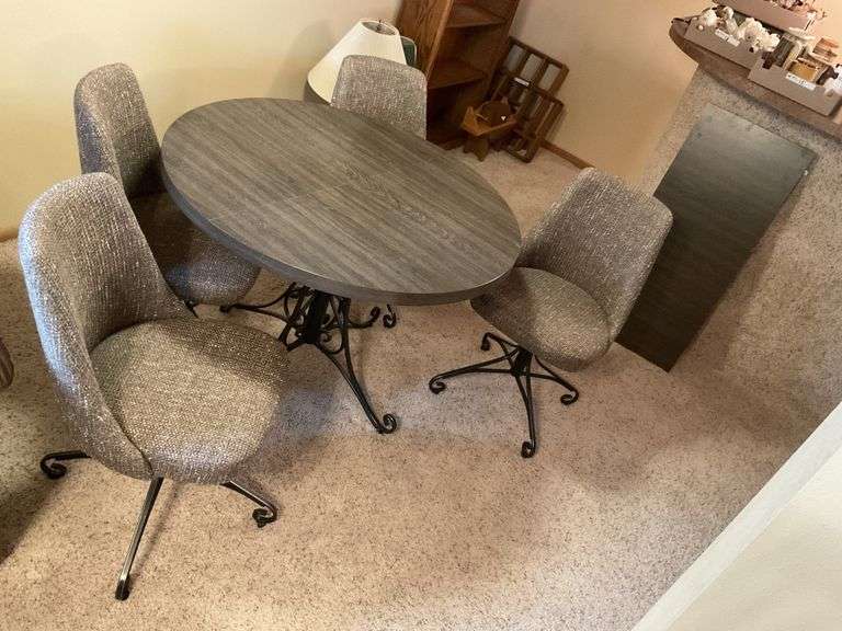 40" table, 4- swivel chairs, 1- leaf