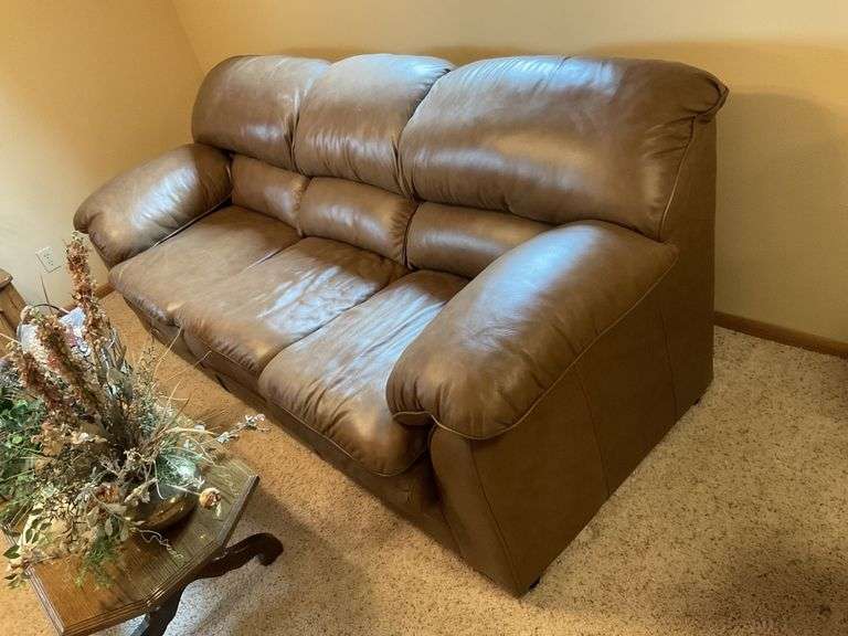 Leather couch in basement, 92''