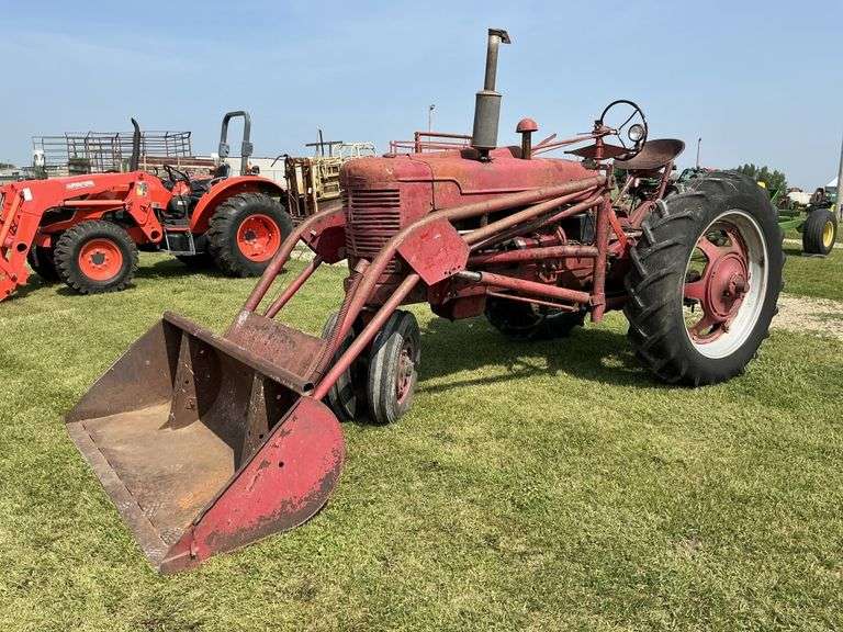 Farmall M tractor with loader, runs. - Legacy Auction Company