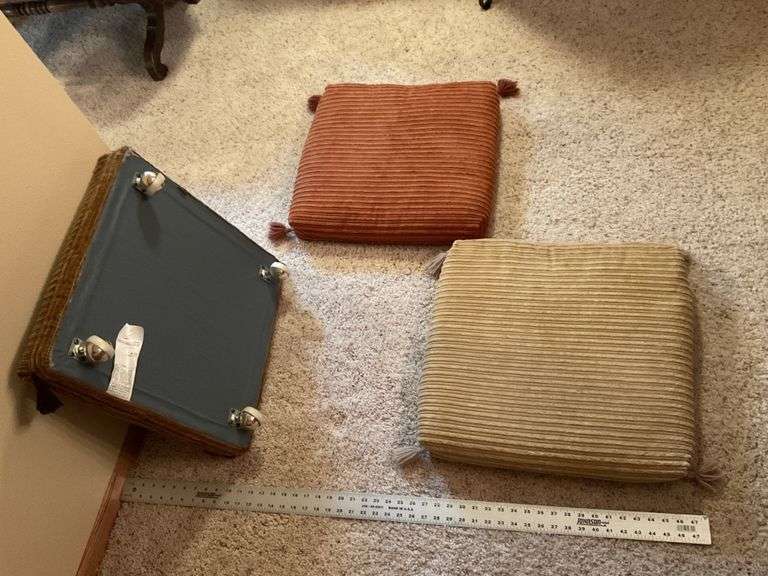 Footstool/pillow set on casters