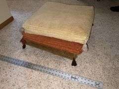 Footstool/pillow set on casters