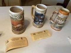 Assorted beer steins and shaving mug