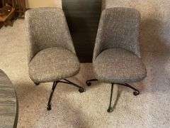 40" table, 4- swivel chairs, 1- leaf