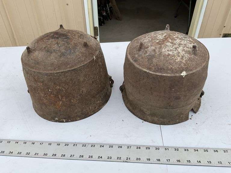 2- cast, footed kettles