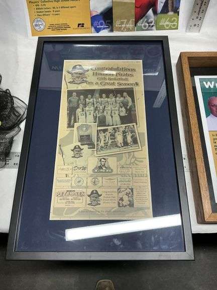 Local football wall hangings and Hawkeyes wreath